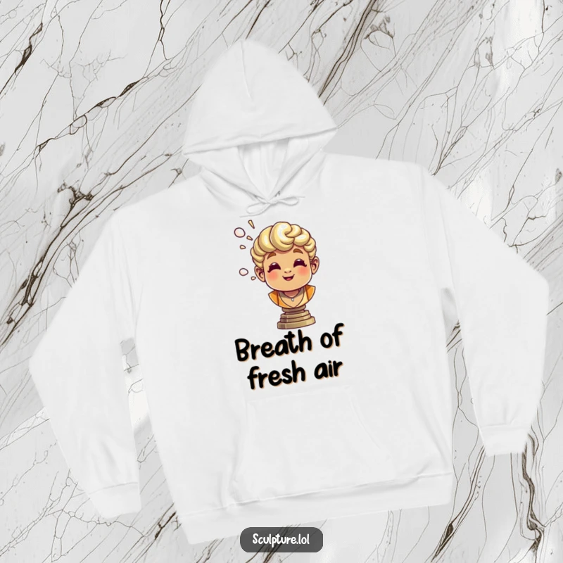 Funny bronze bust hoodie depicting a cheerful sculpture playfully exhaling air, perfect for cozy, artistic vibes.