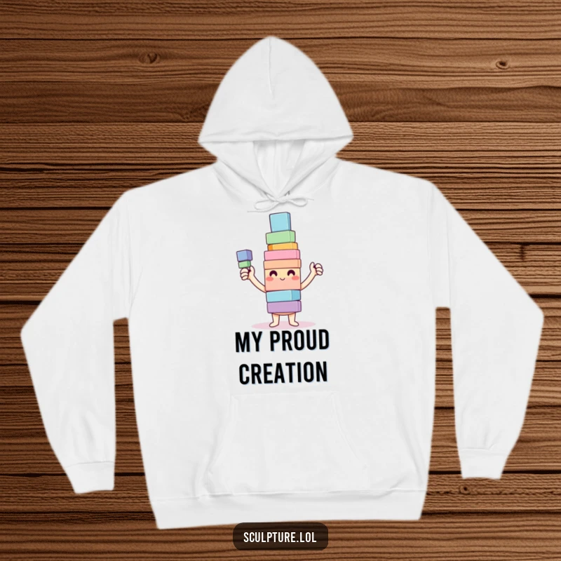 Funny Hoodie with a happy character proudly showing a colorful, wobbly tower of blocks, offering warmth and cheerful vibes.